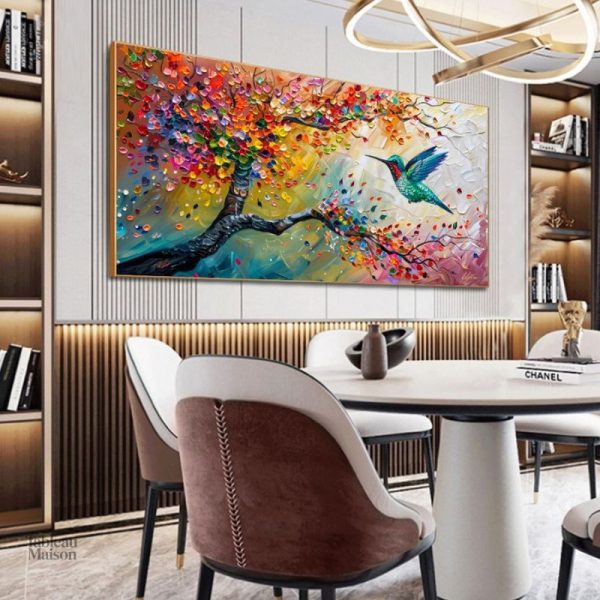 Peinture d'un arbre fleuri avec un colibri en vol