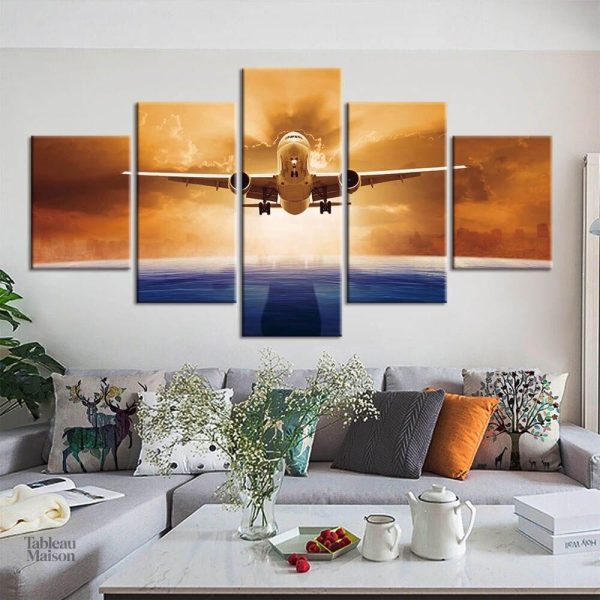Art mural représentant un avion s'élevant dans le ciel