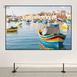 Tableau représentant des bateaux dans le paysage maltais