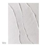 Élément décoratif blanc avec effet texturé