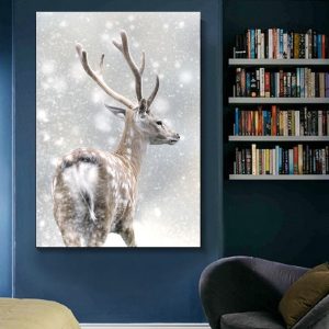 Tableau cerf dans un paysage enneigé