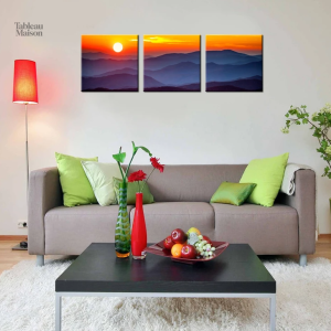 Tableau coucher de soleil sur des montagnes majestueuses