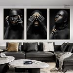 Art mural représentant une silhouette féminine en noir et or