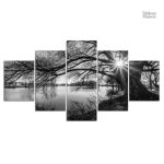 Tableau représentant un lac au lever du soleil, atmosphère tranquille