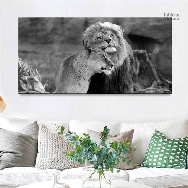 Tableau noir et blanc de lion et lionne en harmonie
