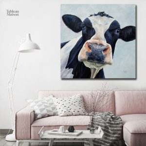 Oeuvre d'art représentant une vache à lait en ambiance campagnarde