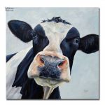 Tableau animalier mettant en valeur une vache à lait charmante