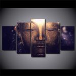 Art mural représentant le visage serein de Bouddha
