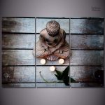 Représentation artistique de Bouddha en bois